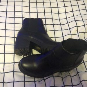 high heeled black combat boots, worn once